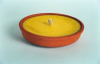 Candela citronella con ciotola terracotta